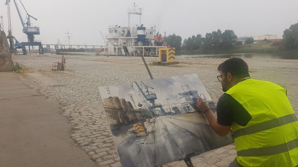 Más de 30 artistas se reúnen en el Muelle de Tablada en el certamen de pintura al aire libre Puerto de Sevilla